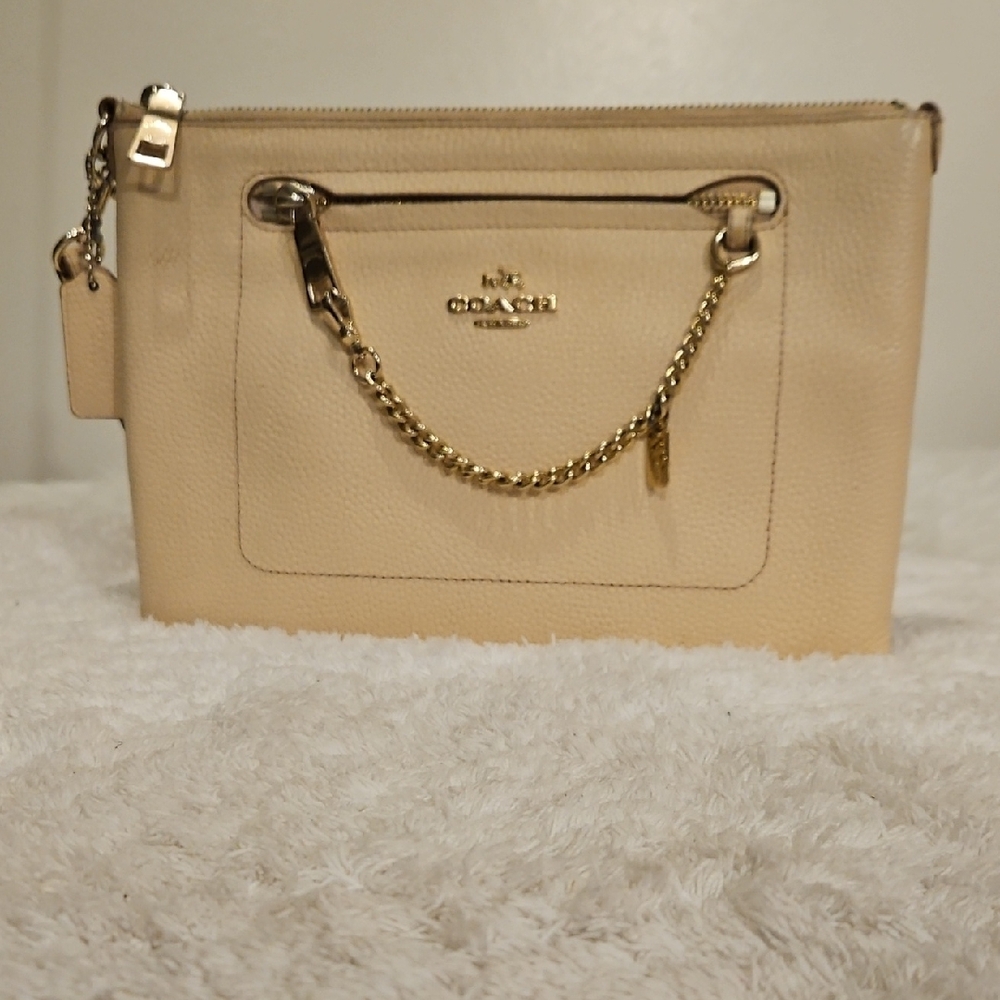 Coach Polished Leather Clutch In Light Blush/ Cream.